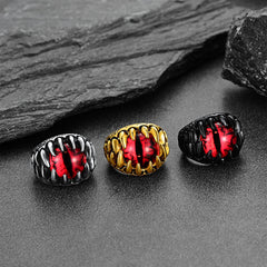 Anel masculino com dentes de dragão gótico e olhos vermelhos malignos